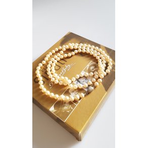 Vintage perlekde i rosa nuancer prydet med ls af slv