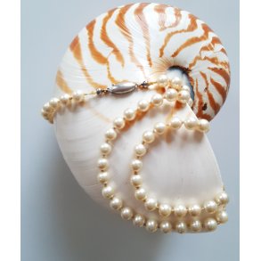 vintage perlekde prydet med slv ls