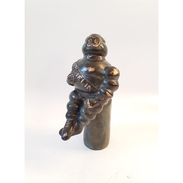 Michelin mand skulptur i patineret bronze