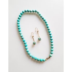 Retro smykkest udfrt i turkis og frgyld metal