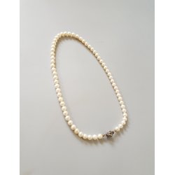 Perlekde prydet med slv ls