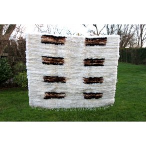 Hndvvet islandsk lammeskind tppe