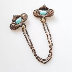 Vintage broche i bronze mad bl sten
