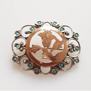 Sknvirke broche i slv/forgyldt slv med turkis