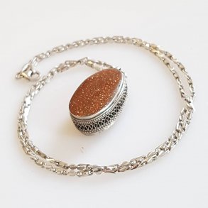 Vintage halssmykke i slv med guldsten