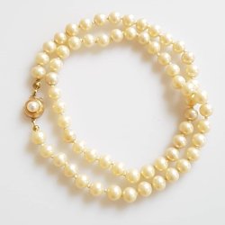 Herman Siersbl perlekde prydet med ls af 14 karat guld