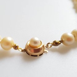 Herman Siersbl perlekde prydet med ls af 14 karat guld