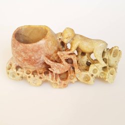 Gammel figur udskret i fedtsten