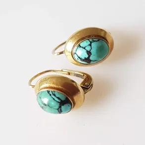 Retro reringe i 14 karat guld prydet med turkis