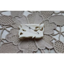 Broche udskret i ben