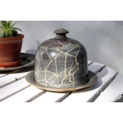 Aino Grib osteklokke