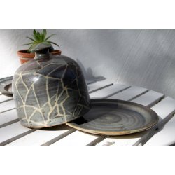 Aino Grib osteklokke