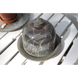 Aino Grib osteklokke