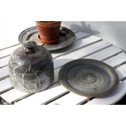 Aino Grib osteklokke